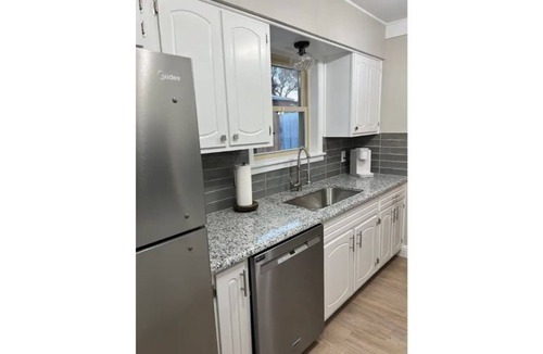 Guymon House | Updated three bedroom home across from park