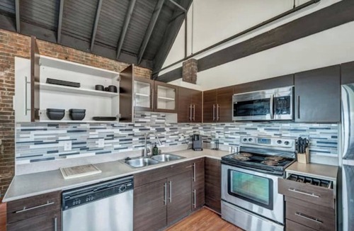 Tremont House | Urban Industrial Penthouse | Game Room Pool Table