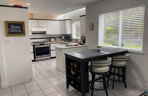 Surrey House | Warm and charming pet friendly home in Crescent Village and steps to the Beach.