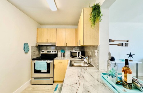 Eastern Shores Apartment | Waterfront 1BR | Parking | Walk to the Beach