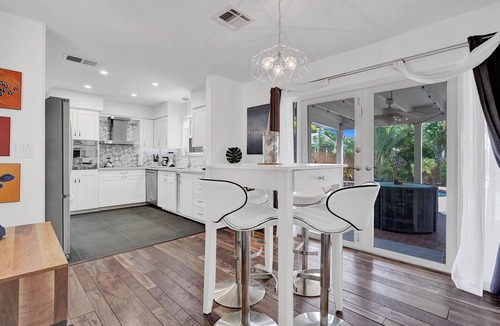 Coral Ridge Isles House | Waterfront 2BR Home Heated Pool BBQ Parking!