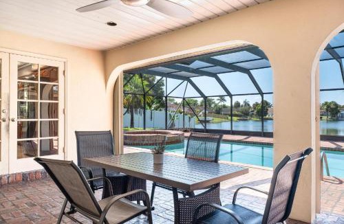 Tamarac House | Waterfront 5BR Home with Game room Pool Sleeps 10