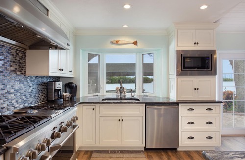 Sunnyland Beach House | Waterfront-Dolphins-Walk to Beach-Pool-Dock-BEAGLE POINT
