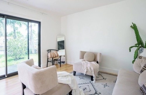 North Central Hollywood House | Waterfront Master bedroom.