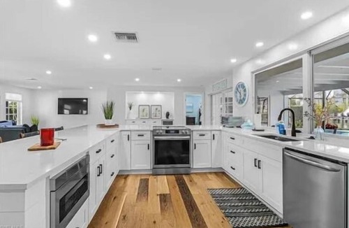 Coquina Sands House | Waterfront paradise walking distance to the beach & minutes to downtown Naples!