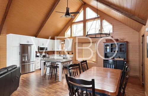 Gilford House | Winnipesaukee Beach house sits on 100’ of frontage and includes a dock slip