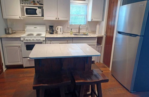 Winnisquam Cottage | Your Lakeside Getaway: Cozy Cottage, Dock, Endless Family Fun!
