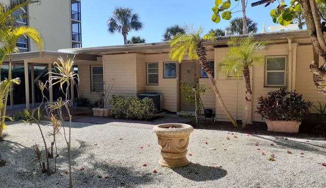 2 BR Beach front villa with enclosed lanai overlooking the pool