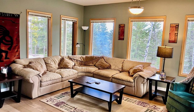 2 Min to Kananaskis! Beautifully Furnished 1640 sq ft Lower Suite on Acreage.