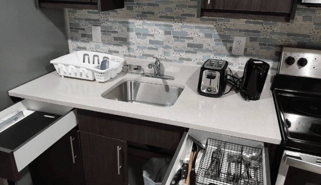 A cozy one bedroom suite located in the peaceful neighborhood of Evergreen.