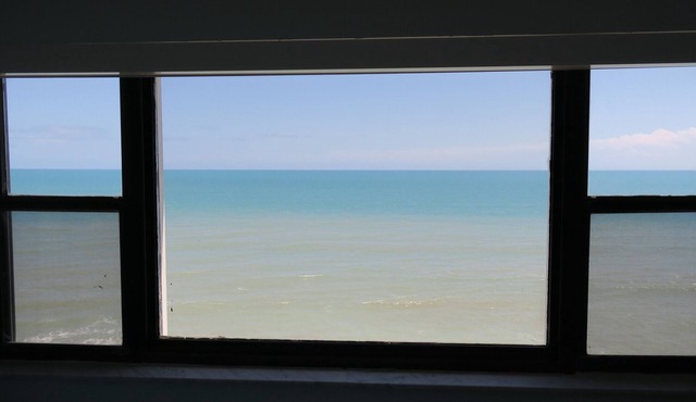 Beachfront condo with a private beach and endless views of the Treasure Coast.