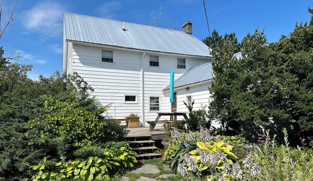 Charming Farmhouse with pond & views on 11+ acres. Trails & Sledding hill