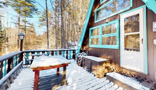 Charming gingerbread A-frame situated on 3 acres, woodstove, A/C, deck