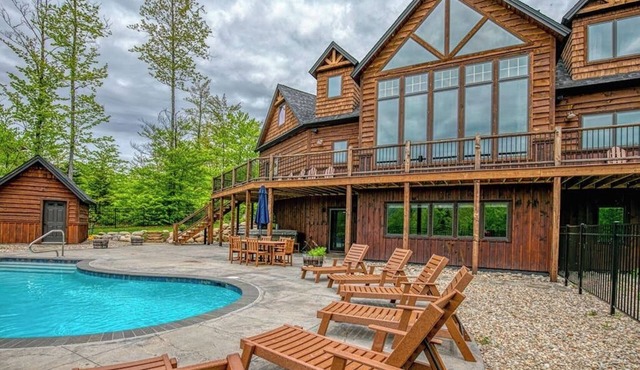 Elegant mountain-view home with private hot tub, saltwater pool & foosball