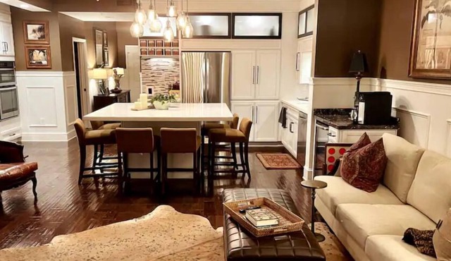 Enjoy a Poolside Luxury Condo and dock, & only a 3 min walk to Vanderbilt Beach.