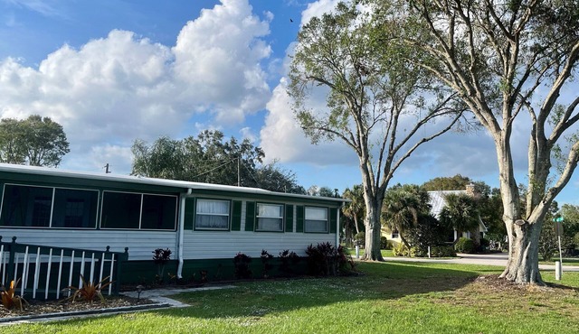 Find serenity at this family-sized Lake Okeechobee home.