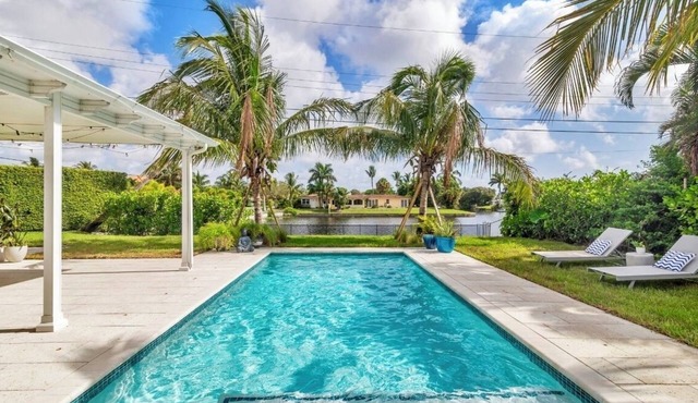 Fully upgraded waterfront pool home, centrally located in West Palm Beach!