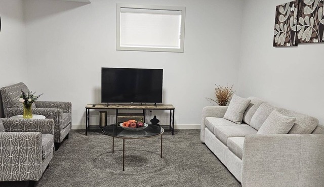 Lanark Airdrie home near airport, CrossIron Mills, shopping & dining.