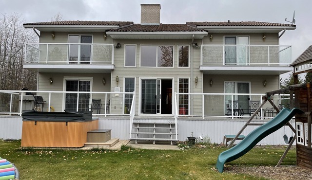 Large family or group vacation lake home with dock and boats 35 minutes from WEM