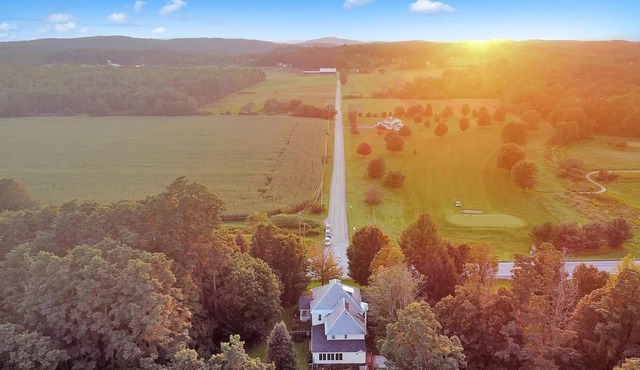 Large Greek Revival, spacious inside & out! Close to lakes & ski mountains!