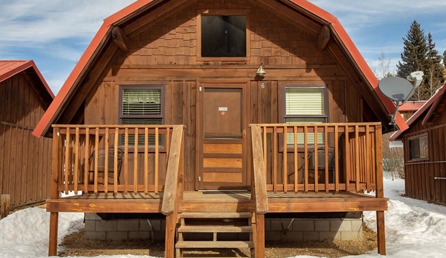 Located on the river, facing the Mountains
