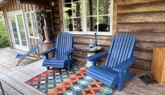 Log Cabin on River Acreage
