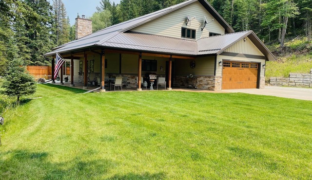 Modern and spacious cabin nestled along the banks of Elk Creek.