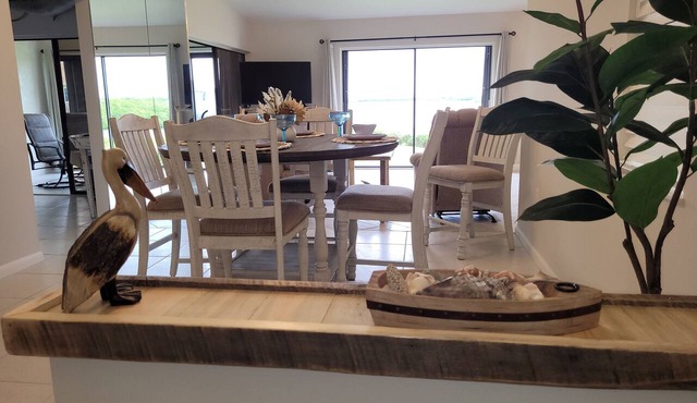 Ocean themed condo w/direct water views and close walk to private beach