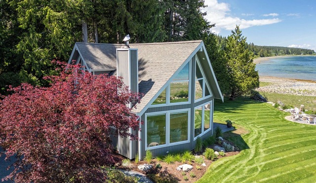 Open Design West Coast Home on 1600 Feet of Private Waterfront