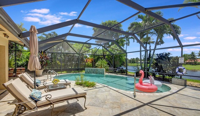 Private Oasis in Delray Beach with pool, game room and lake views!