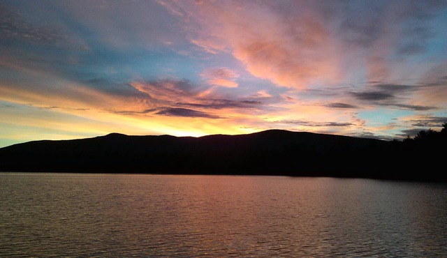 Quiet waterfront home on Lees Pond with Ossipee Mountain views.