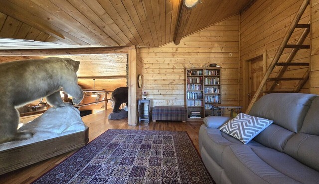 Room 6 at the Main Lodge with a queen bed and single bed.
