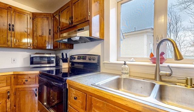 Vintage two-story home in the heart of town with a washer/dryer, full kitchen