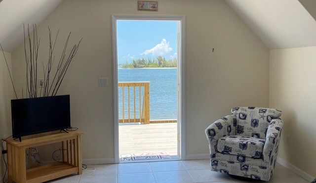 Waterfront Studio with pool and boat dock