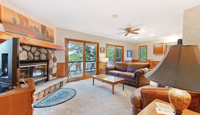Waterfront villa w/ fireplace, deck & shared tennis/game room - dogs welcome!