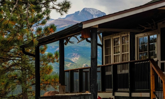 Estes Park House | Historic Cabin with a Mix of Antique and Modern; Croquet Court to Try Your Skill