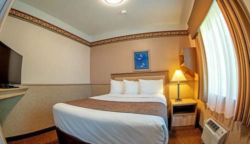 Deluxe Suite, 3 Queen Beds 