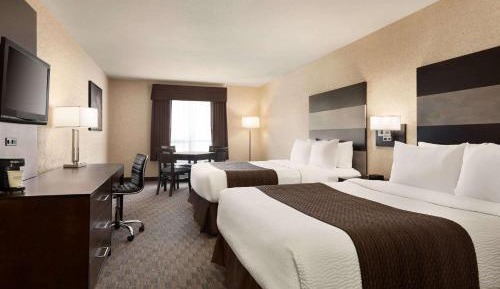 Deluxe Room with Two Queen Beds and One Sofa Bed - Non-Smoking